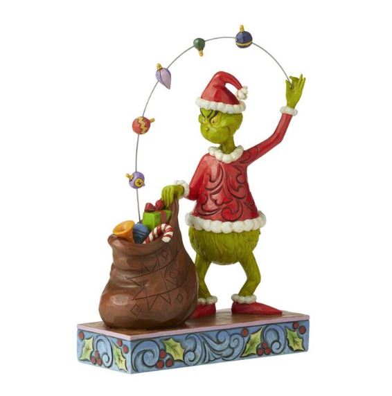 Grinch Juggling Gifts into Bag